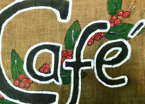 Hand-painted cafe sign