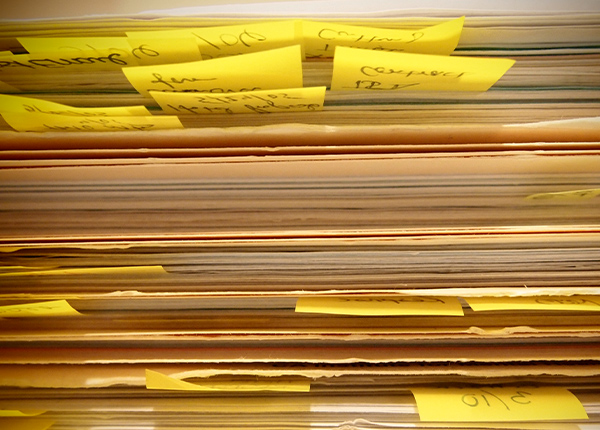 Files with post-it notes