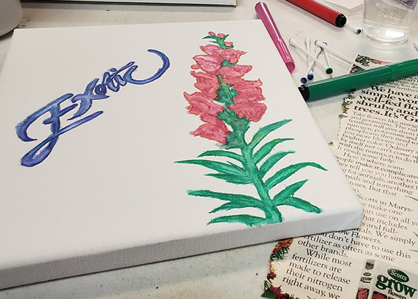 Painting of a flower with the word "exotic" next to it