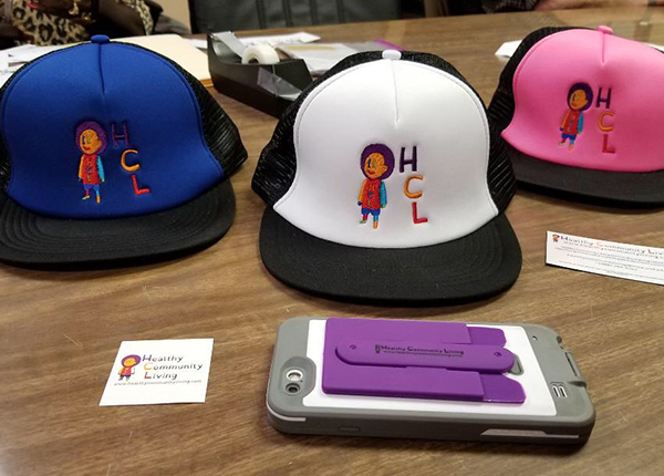 Branded hats and merchandise on a table