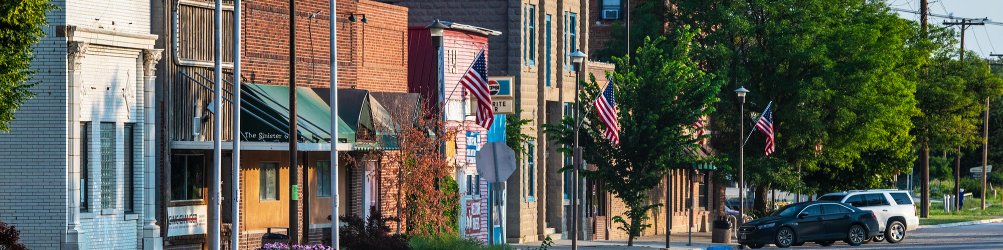 A street lined with businesses in a rural town