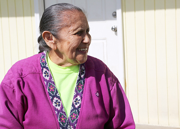 Woman smiling and looking to the side