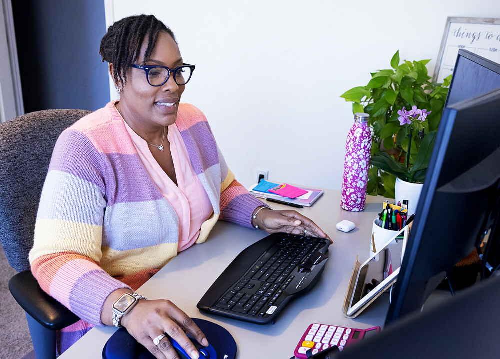 Woman working at a computer