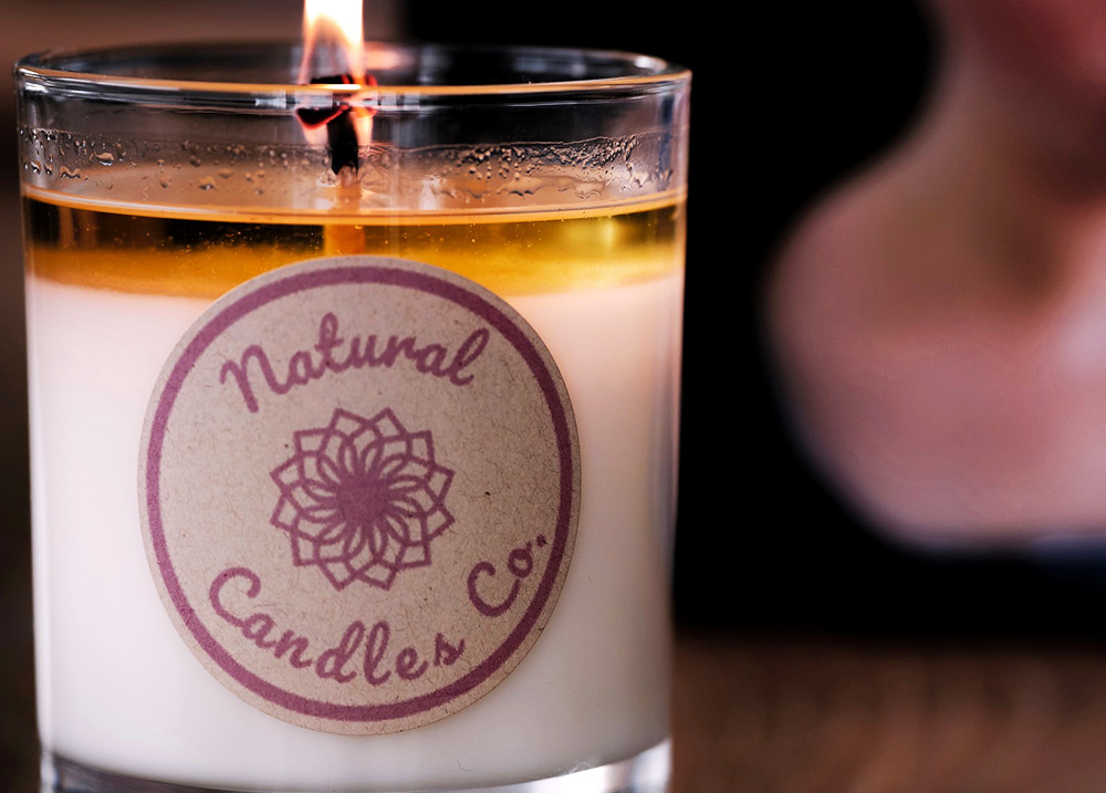 Candle with a label that says Natural Candles Co.