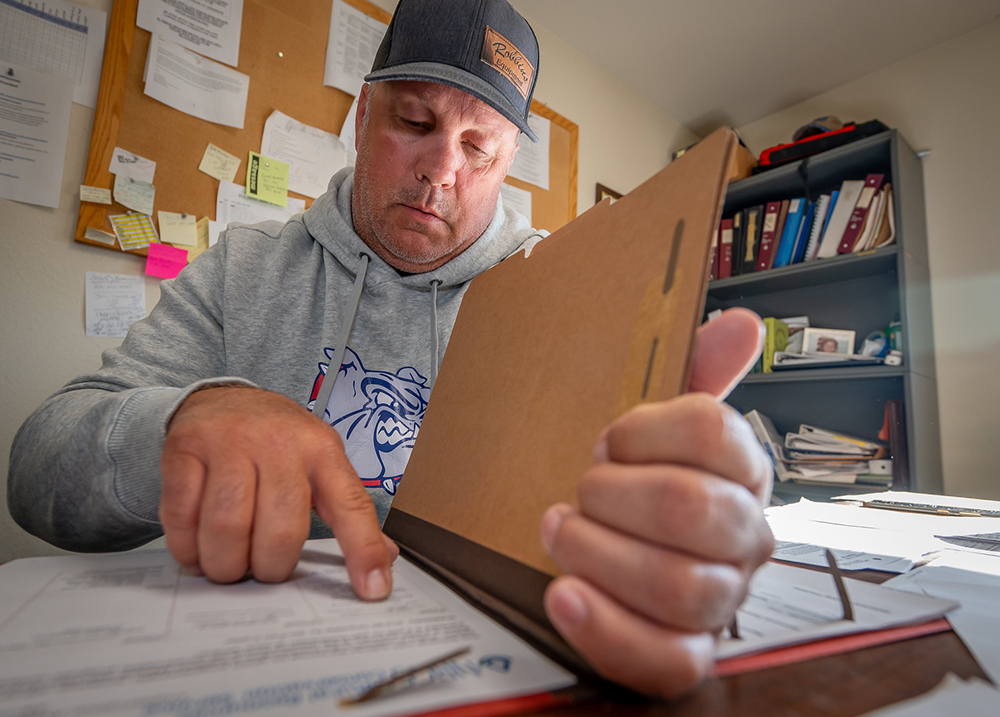 Man looking at paperwork