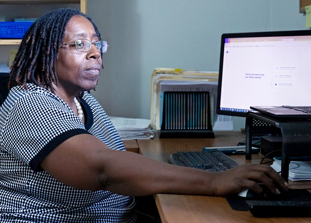 Woman working at a computer