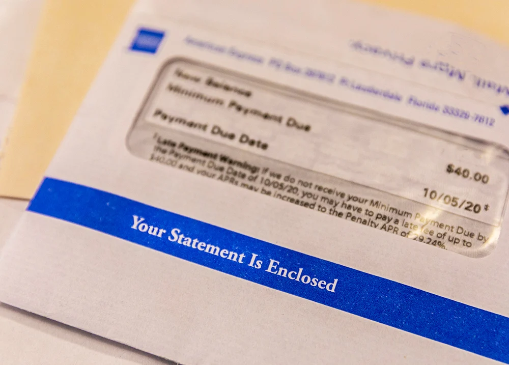 Envelop with a clear section that shows a bill inside
