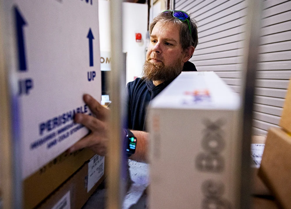 Man grabbing a package
