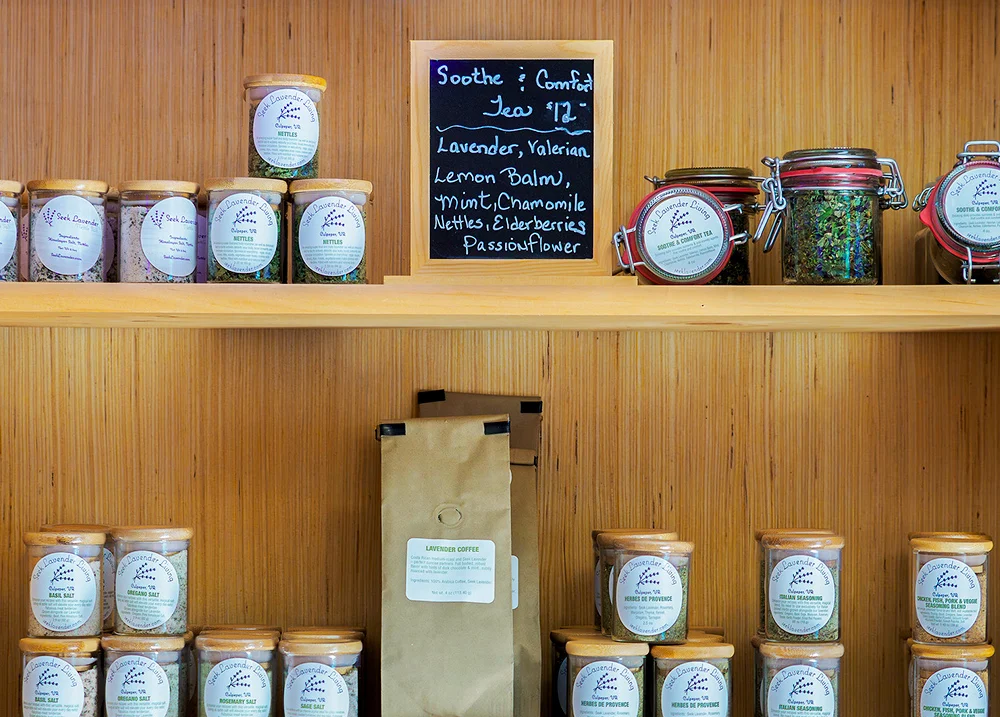 Jars of loose leaf tea on a shelf