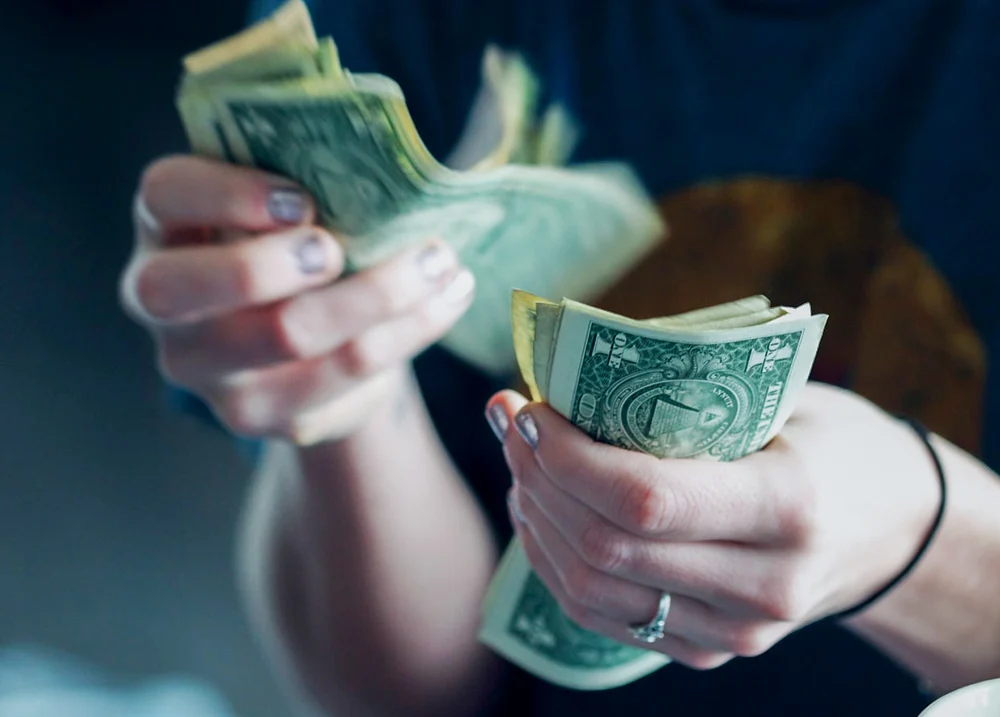 Hands counting money