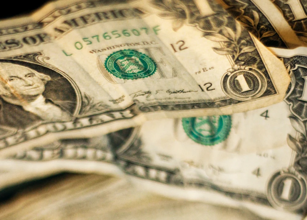 Crinkled dollar bills