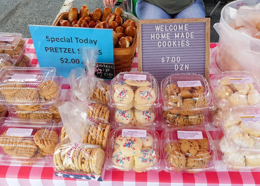Cookies in plastic containers for sale at a market
